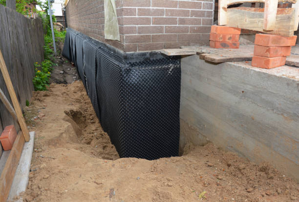 SJ Waterproofing Pros technician performing targeted Crawl Space Encapsulation assessment in Dadeville, AL